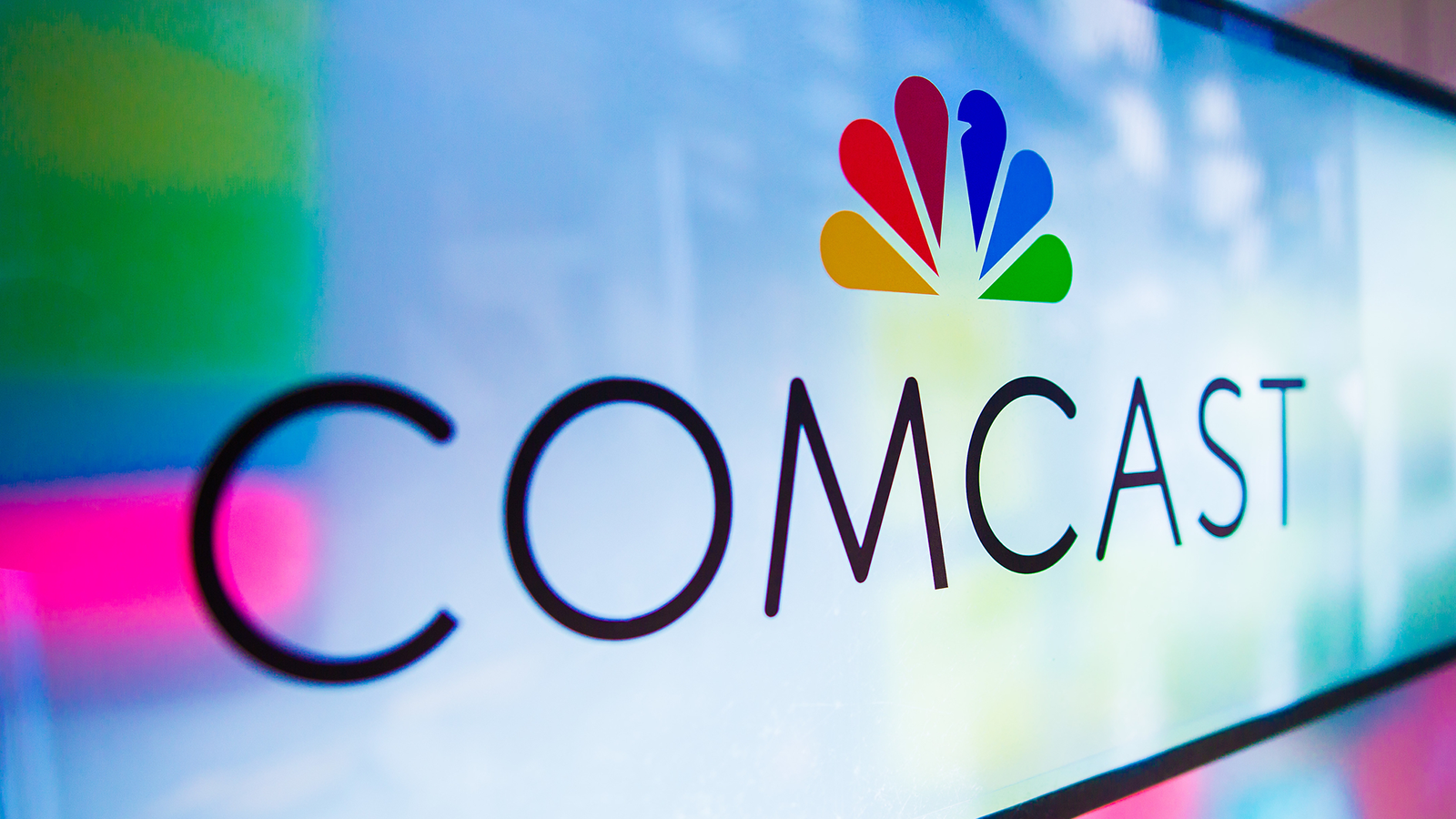 comcast logo on wall