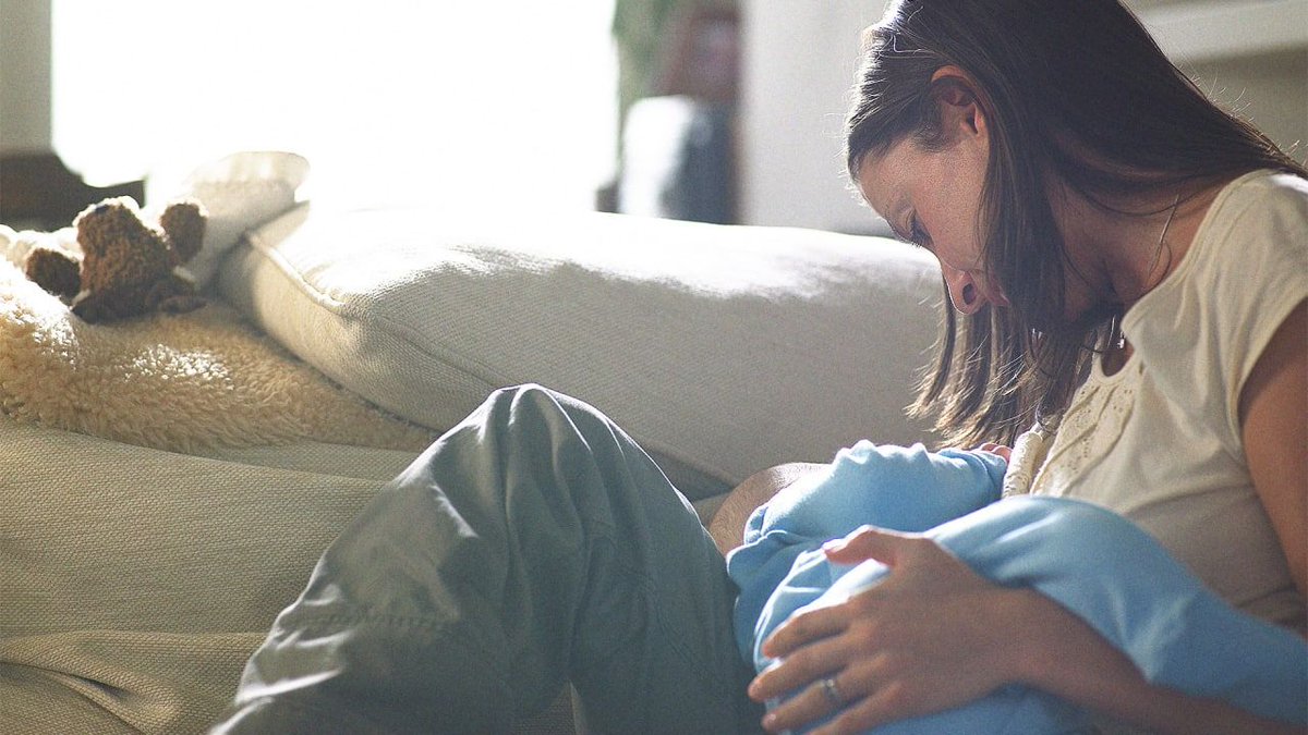 a woman with a baby